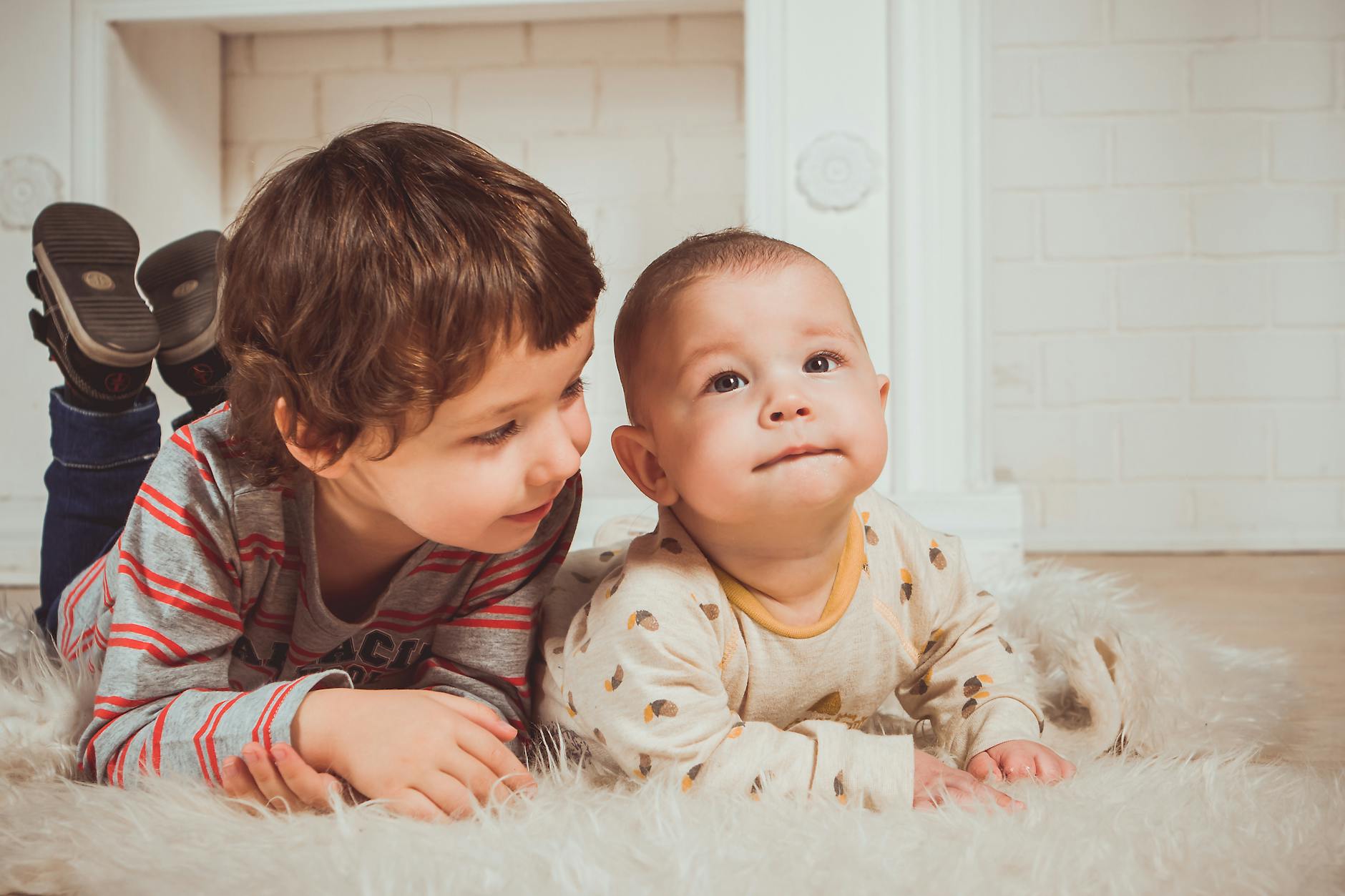 toddler and a baby