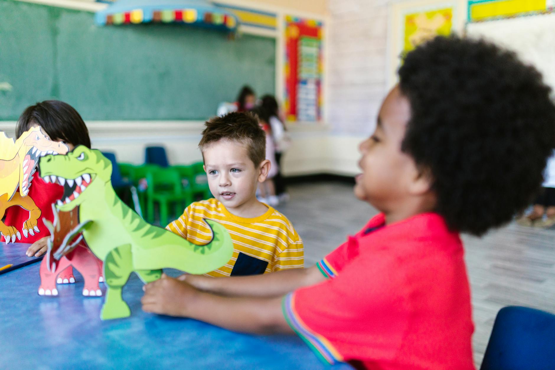 kids playing with dinosaurs