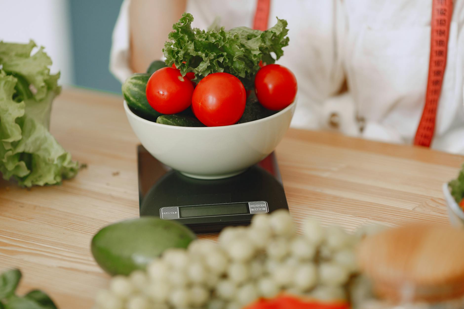 close up of fresh vegetables on scales