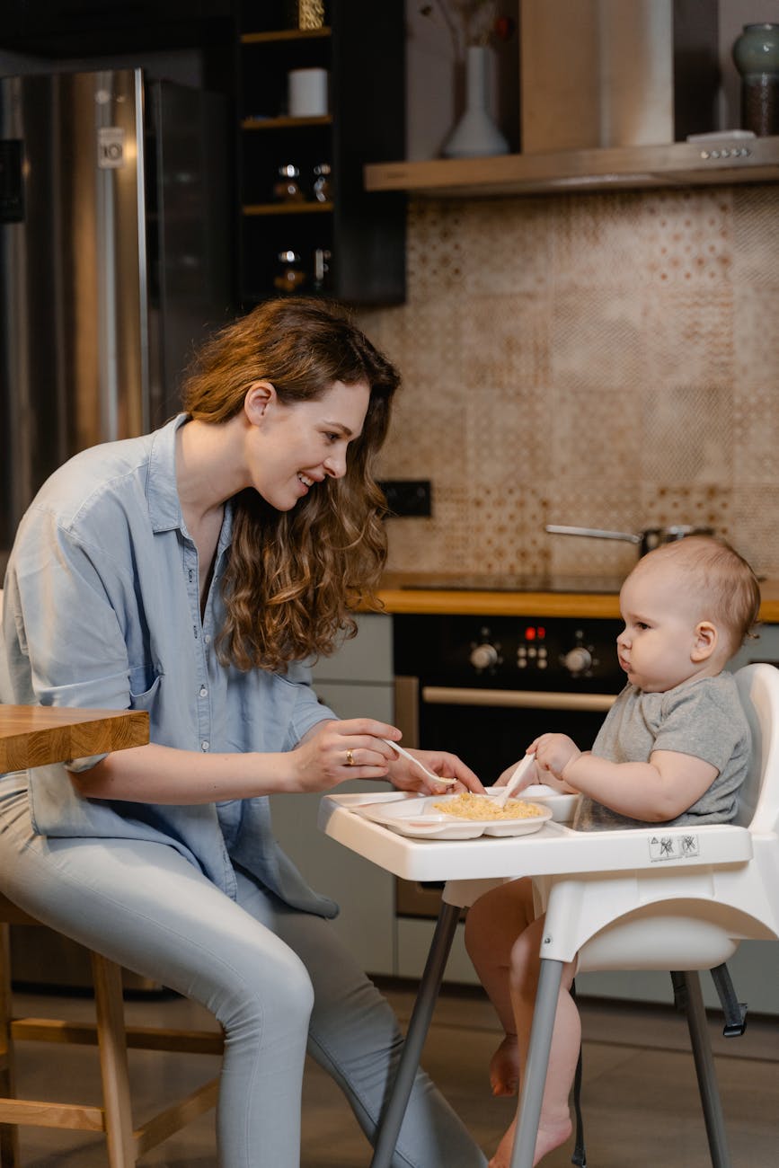 photo of a mother feeding her baby